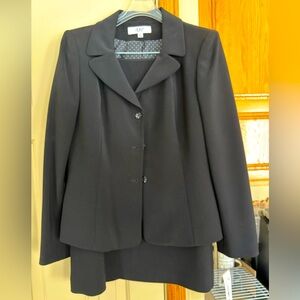 Women’s black Jacket and skirt suit. Brand new. Never worn.